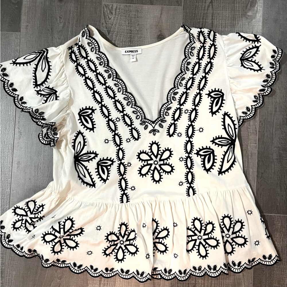 Express Peplum Style Shirt with deep navy details. Size L